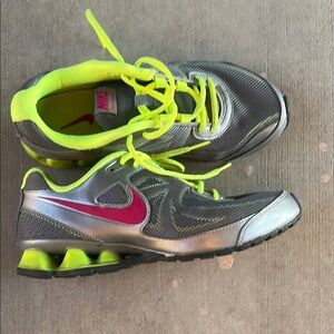 Nike women’s Silver and Pink Athletic Shoes